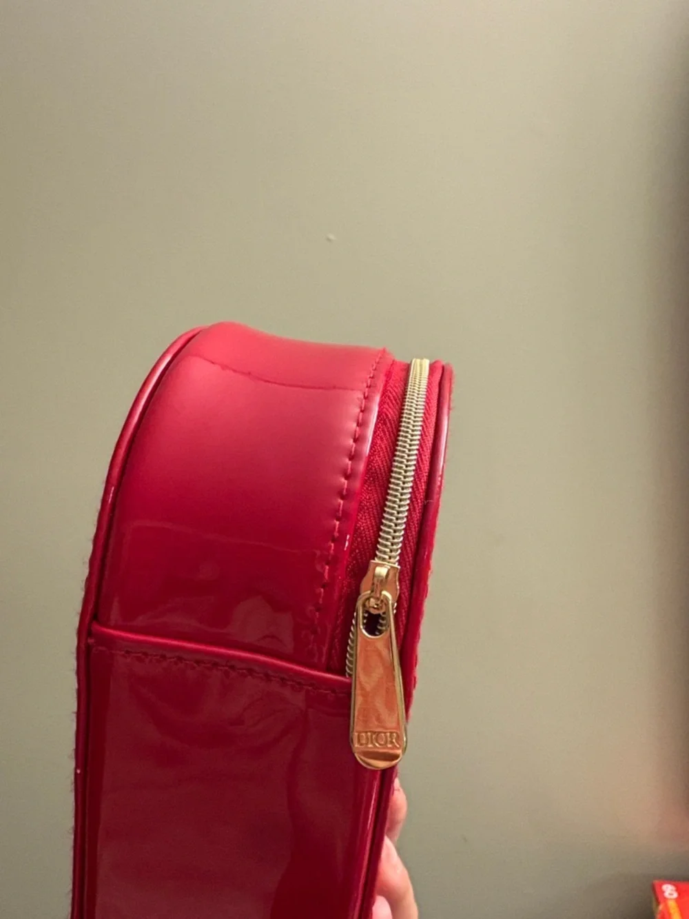 Dior Red Patent Oval Cosmetic Case with Embossed Logo